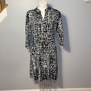 Robert Louis ladies black and white geometric print midi dress. Size medium